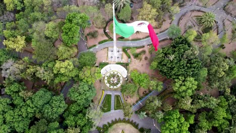 View-of-mexican-flag-In-parque-hundido,-south-Mexico-city