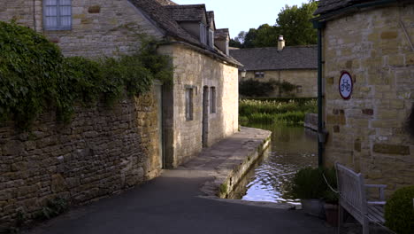 The-footage-shows-a-walkway-through-The-Old-Mill,-Lower-Slaughter,-UK