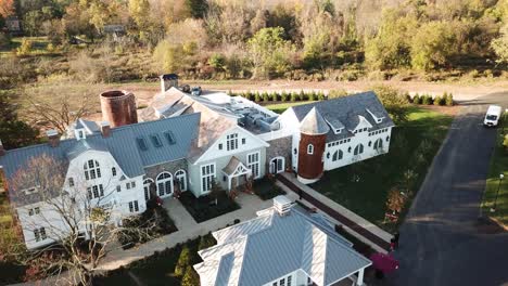 Historical-and-luxury-white-mansion-house-in-aerial-drone-view