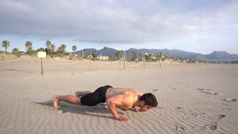 metabolic-workout-on-the-beach-with-lateral-push-ups-variant