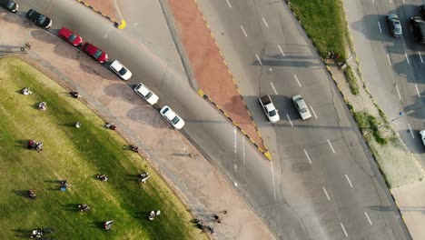 Aerial-shot-of-the-street-while-passing-cars-located-in-Montevideo-Uruguay