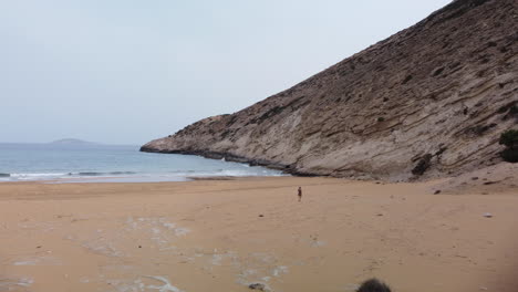 Woman-walks-on-Gavdos-Beach-in-Greece