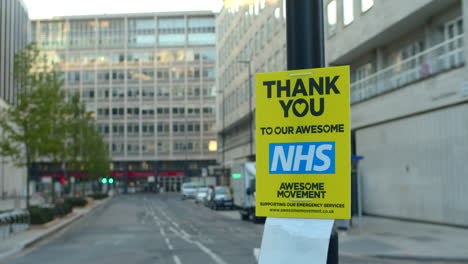 Thank-You-NHS-key-workers-support-sign-poster-during-Covid-pandemic-lockdown,-England