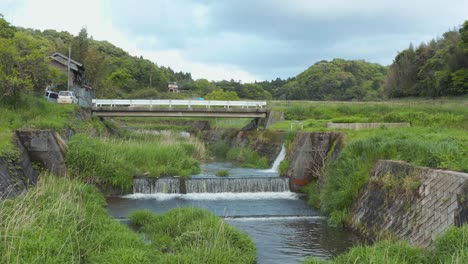 Rural-Japan,-Pullback-Reveal-of-Farmlands-and-River,-Nawa-gawa-Tottori-Japan