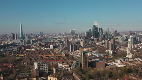 Establishing-Aerial-View-of-Tower-Bridge,-Shard,-London-Skyline,-London,-United-Kingdom