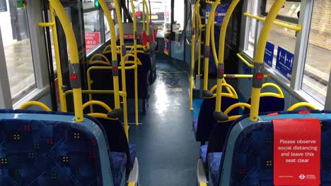 An-empty-London-bus-on-route-during-pandemic-lockdown