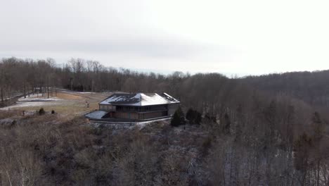 Aerial-Drone-Footage-Orbiting-to-the-Right-Around-an-Abandoned-Lodge