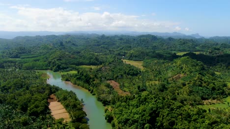 Java-island-inland-aerial-panorama,-river-meanders-in-lush-tropical-forest