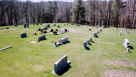 Smooth-Aerial-flyover-of-tombstone-in-graveyard
