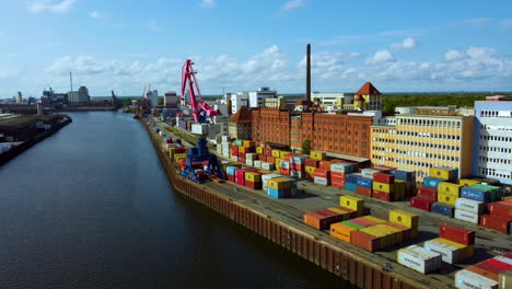 Port-Crane-And-Cargo-Containers-By-The-Weser-River-In-Bremen,-Germany