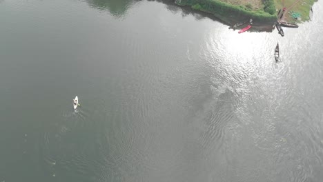 Aerial-birds-eye-view-of-kayaks-and-canoes-on-the-river-banks-of-the-Nile