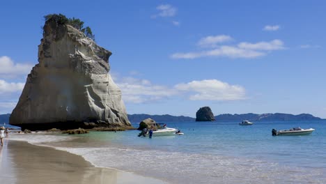 Wide-slow-panning-shot-of-Te-Hoho-rock-and-Cathedral-cove-beach