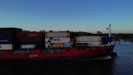 Cargo-Ship-With-Intermodal-Containers-At-Oude-Maas-River-Near-Puttershoek-In-Netherlands