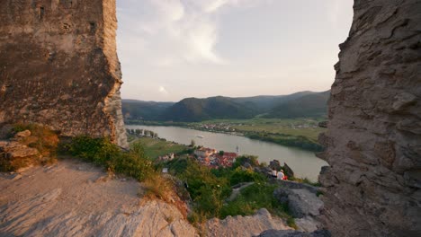 Amazing-view-from-the-mountain-peak-overlooking-the-medieval-Durnstein-castle-ruin-and-town-in-Wachau-valley-Lower-Austria-along-the-river-Danube