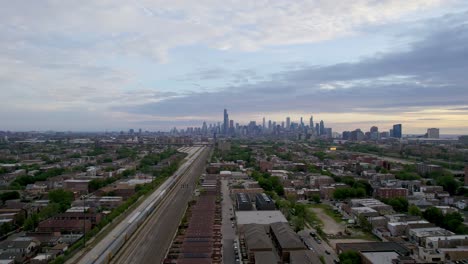 Aerial-Downtown-City-Skyline-With-Clouds-In-The-Morning