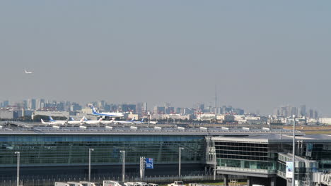 Two-commercial-jet-planes-landing-at-Tokyo-Haneda-International-airport