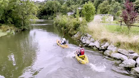 Rural-kayaking-on-inland-waterways,-rivers-and-streams-around-Kinsale,-Ireland-with-lots-of-fun-for-everyone