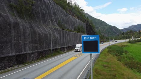 Road-sign-showing-cars-their-speed-while-passing---Measure-to-reduce-speed-and-accidents-along-road-E16-in-Norway