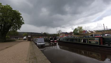 Trevor-basin-British-aqueduct-canal-bridge-boats-time-lapse-under-passing-stormy-weather-clouds