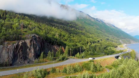 4K-Drone-Video-of-Alaska-Route-1-Along-Mountain-Shoreline-of-Turnagain-Arm
