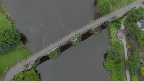 Slow-motion,-birds-eye-view-of-Stirling-Old-Bridge-in-Scotland-while-flying-down