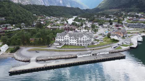 Quality-hotel-Vøringsfoss-and-Eidfjord-city-center---Aerial-view-approaching-hotel-from-seaside-with-Mabodalen-valley-in-background---Norway