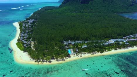 Aerial-view-of-Mauritius-island-panorama-and-famous-Le-Morne-Brabant-mountain,-beautiful-blue-lagoon-and-underwater-waterfall
