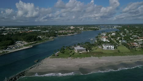 Drone-Over-Jupiter-Inlet-Jetty-Towards-Jupiter-Inlet-Colony-in-South-Florida