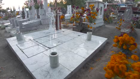 Travel-shot-of-Tombs-adorned-with-cempasuchil-marigold-flowers-for-the-celebration-of-the-day-of-the-dead-in-Mexico-Puebla-Cholula