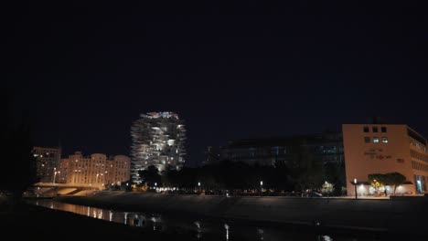 wide-shot:-Bridges-and-buildings-at-night-in-montpellier,-France