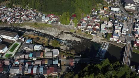 Aerial-view-of-Gujo-hachiman-city-and-Yoshida-river-in-the-morning,-Gifu-Japan