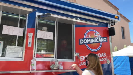 Caucasian-Man-In-Dominican-Republic-Fast-Food-Truck-At-Tucson-Meet-Yourself-Festival-In-Arizona
