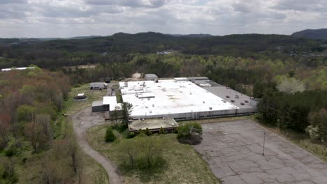 Aerial-Drone-Footage-Orbiting-Left-Around-an-Abandoned-National-Standard-Factory