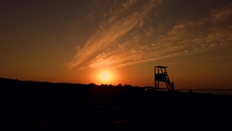 Lifeguard-Tower-Silhouetted-by-the-Sunset