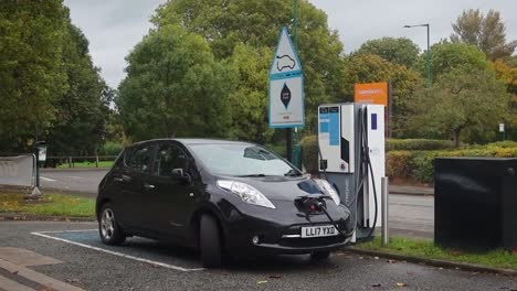 An-electric-car-being-charged-at-the-forecourt-of-a-normal-filling-station---Rectory-Lane-in-Guisborough