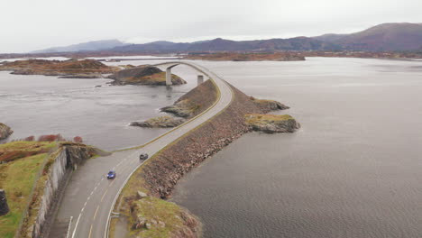 Aerial-Orbit-Of-Atlantic-Ocean-road-With-Cars-Crossing-Storseisundet-Bridge,-Norway