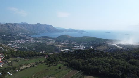 Aerial-shot-over-the-bay-of-Dubrovnik-and-Dinaric-Alps-with-Adriatic-Sea,-Croatia
