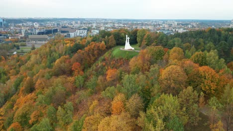 AERIAL:-The-Hill-of-Three-Crosses-with-Vilnius-City-Panorama-in-Autumn