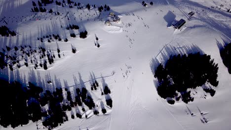 Aerial-view-of-a-ski-slope-in-a-ski-resort-in-the-Tyrolean-Alps-in-Austria