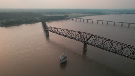 Aerial-parallax-around-Chain-of-Rocks-bridge-Missouri-during-golden-hour