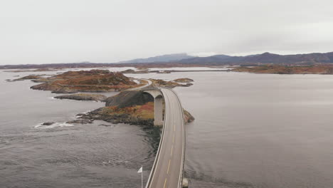 Aerial-View-Of-Famous-Atlantic-Ocean-Road-With-Cloudy-Sky-in-Norway