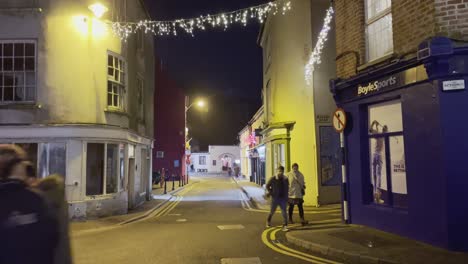 December-in-Kinsale-with-couple-walking-and-boys-passing-by