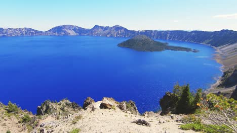 Wide-angle-panoramic-shot-of-the-caldera-forming-Crater-Lake-and-Angel-Island-in-Oregon