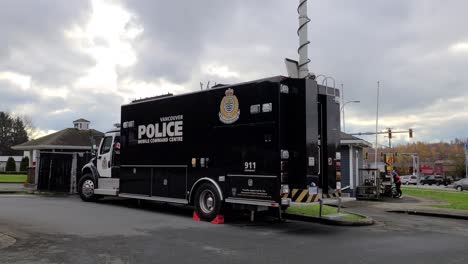 A-unit-of-a-mobile-police-command-center-parked-near-a-road-in-Abbotsford,-British-Colombia