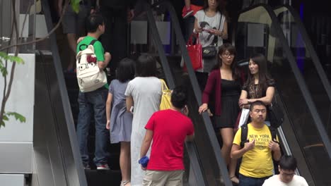 Slow-motion-of-chinese-people-on-escalator-in-Hong-Kong-before-covid19