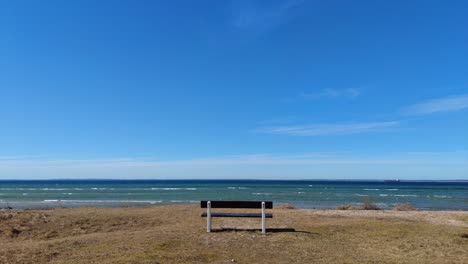 empty-bench-on-the-beach