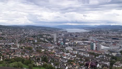 Epic-Zurich-city-timelapse-on-a-cloudy-mystery-day,-panorama-view-to-lake-Zurich