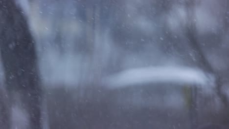 Snowfall-On-Wintertime-At-The-City-Against-Shallow-Depth-Of-Field