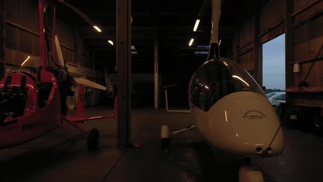 Gyrocopter-4K-internal-low-pass-3x-gyros-including-Calidus-inside-private-hangar-low-light