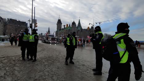 police-officers-stand-guard-during-Freedom-convoy-in-Canada-on-January-30st-2022